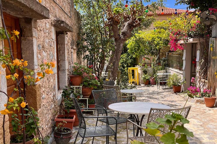 Traditional Greek village cafe at Yioryitsas Backyard in Kardamyli, Greece